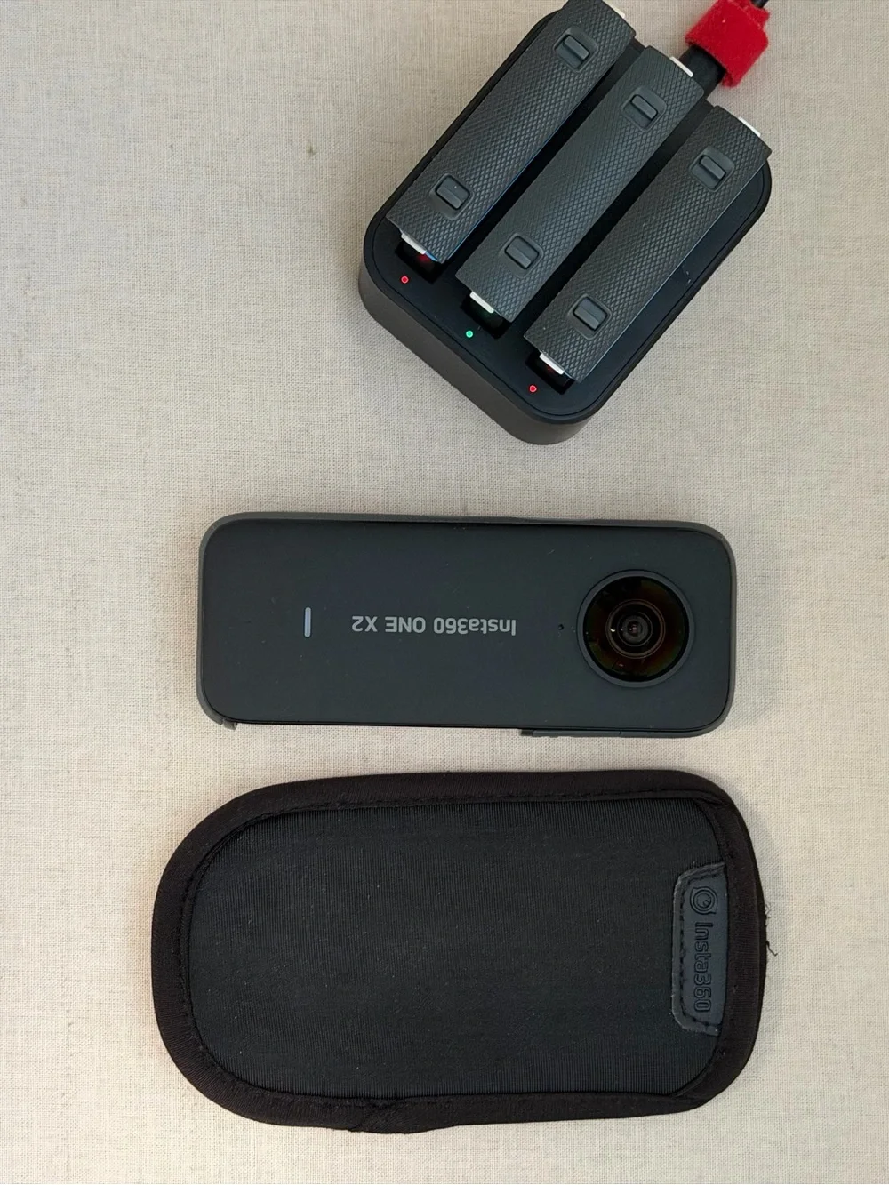 Insta360 X2 with accessories and case